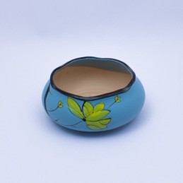 Maceta baja con flores