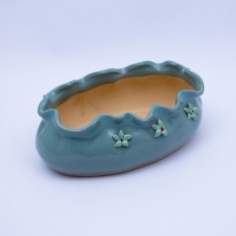 Maceta lisa con flor de relieve 18.5x13.6cm