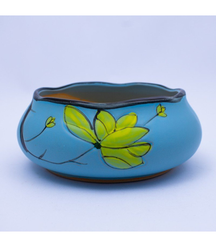 Maceta baja con flores