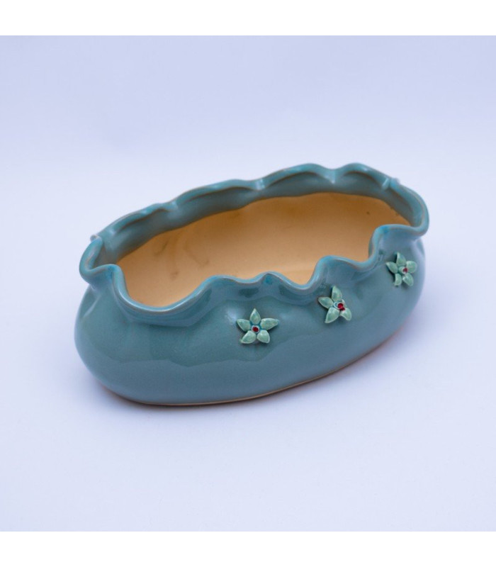 Maceta lisa con flor de relieve 18.5x13.6cm